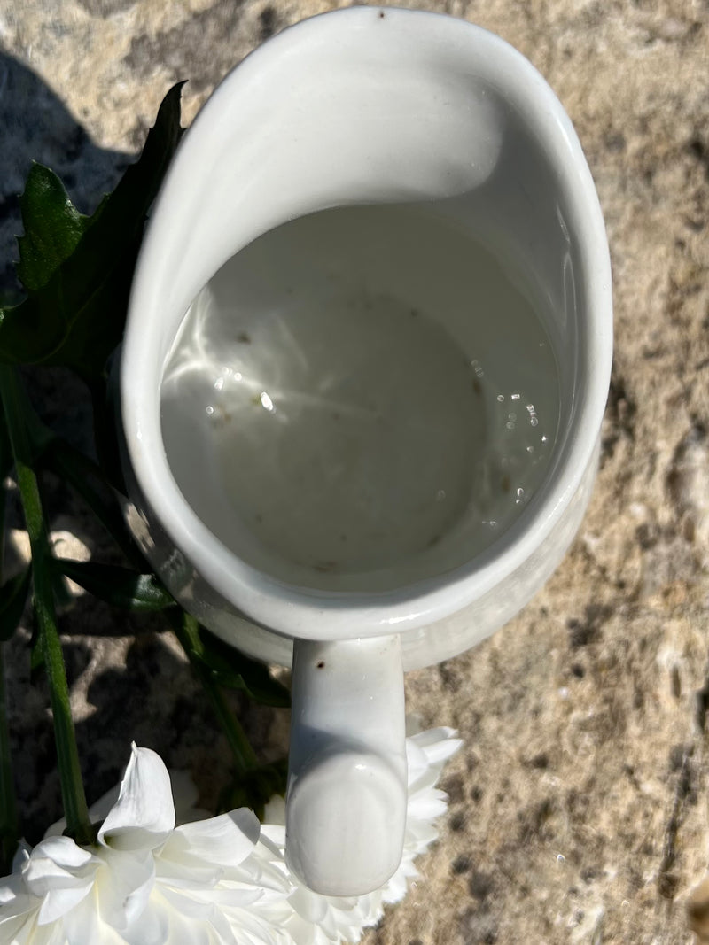 Vintage white porcelain milk pitcher