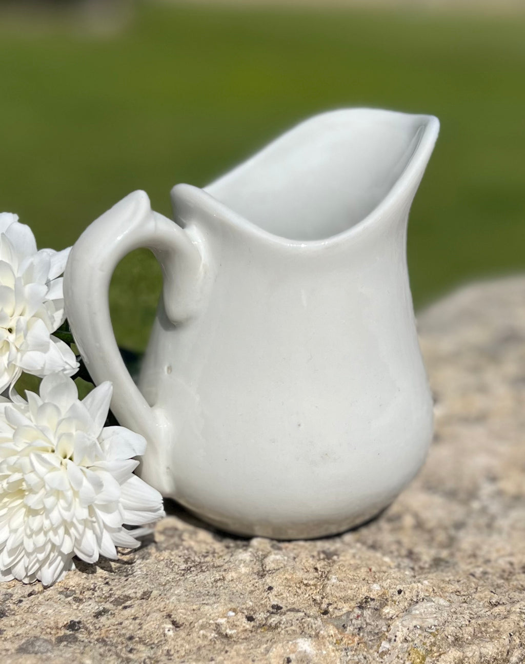 Vintage white porcelain milk pitcher