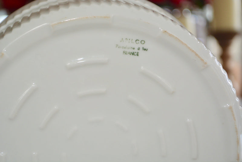 Vintage Apilco Soufflé Dish  Great piece for any white collection. This vintage Apilco Souffle Dish is a gem. Its deep and wide and useful for so much more than soufflés!  8.5"wide x 4"deep  Made in France by Apilco