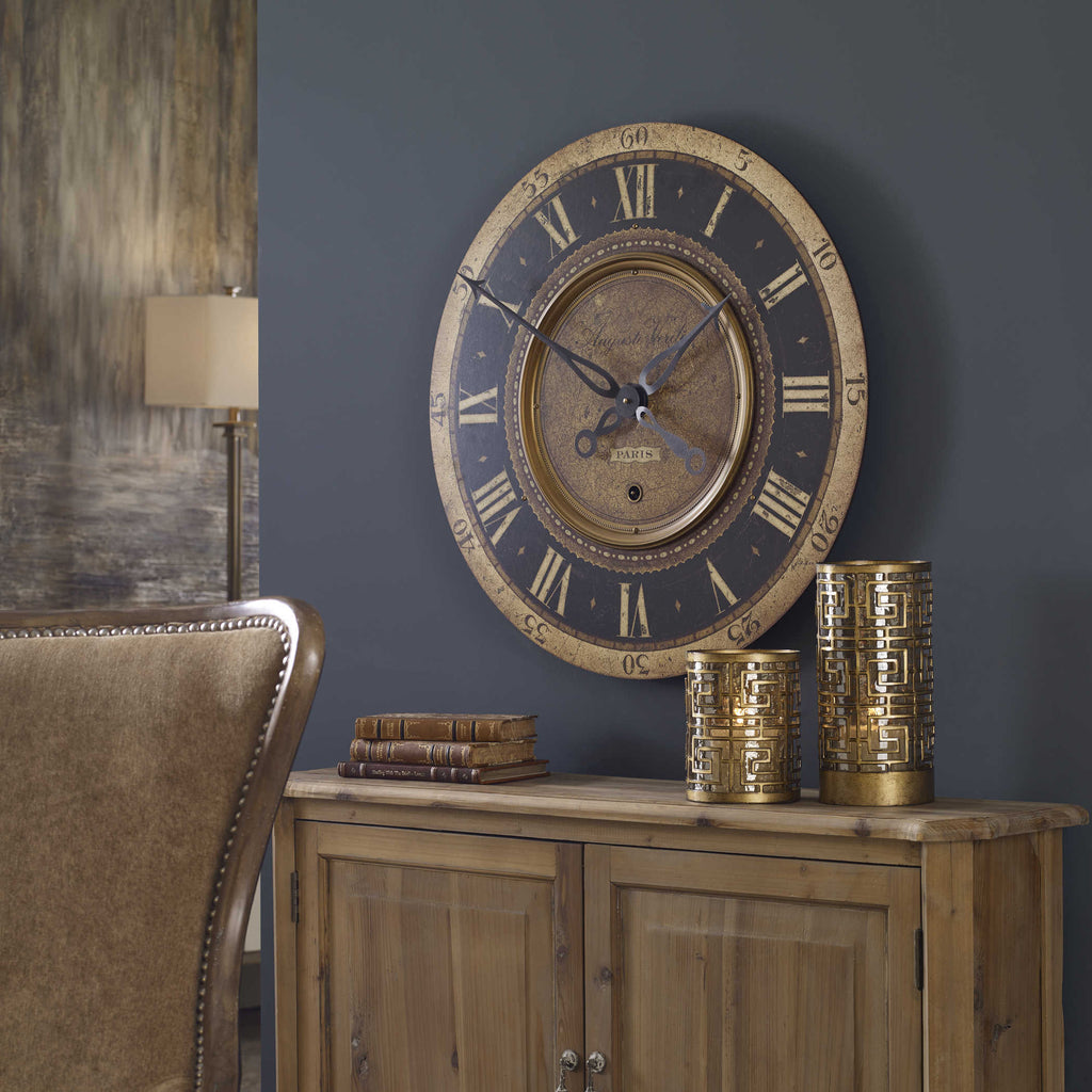 Auguste Verdier Wall Clock  Weathered, laminated clock face with cast antiqued brass details. Quartz movement ensures accurate timekeeping. Requires one "AA" battery.  Dimensions:27 W X 27 H X 3 D (in)
